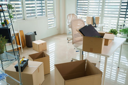 Adult Asian couple shares excitement embracing their new business space with hope collaboration...