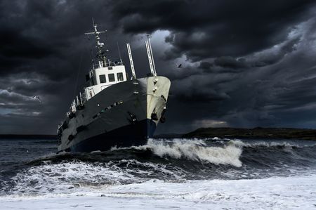 Ship on the storm seaの写真素材