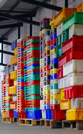 Colorful stacked plastic containers fisheriesの写真素材