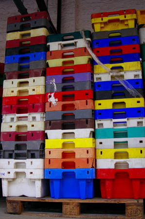 Colorful stacked plastic containers fisheriesの写真素材