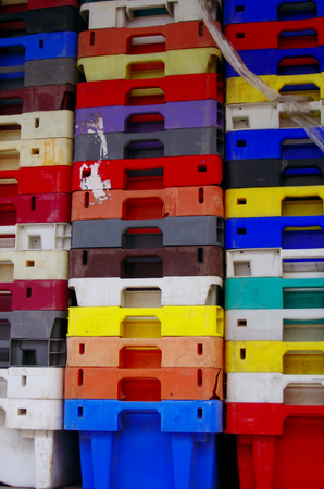 Colorful stacked plastic containers fisheriesの写真素材