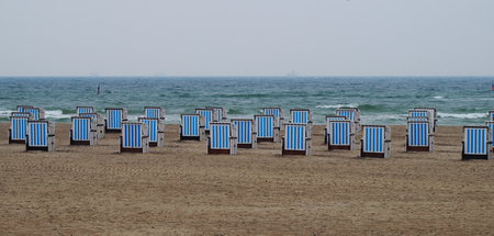 Beach chairs in bad weather on the Baltic Seaの写真素材