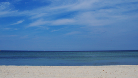 Blue sky and white beach at the Baltic sea at Timmendorf beachの写真素材