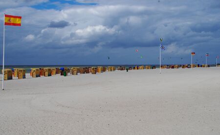 Beach chairs on the beach of Laboe near Kiel bad weather dayの写真素材