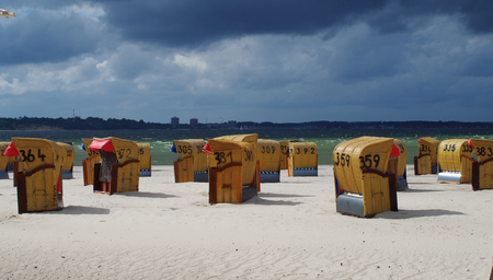 Beach chairs on the beach of Laboe near Kiel bad weather dayの写真素材