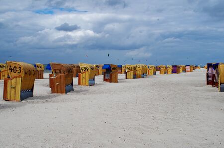 Beach chairs on the beach of Laboe near Kiel bad weather dayの写真素材