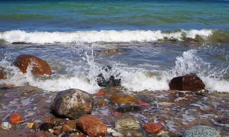 Waves on stones on Baltic sea beachの写真素材