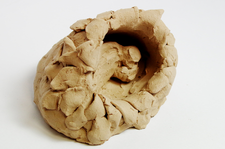 Sculpture made of clay on the subject of trust and securityの写真素材