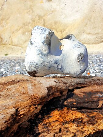 Large flint with a hole off the chalk coast on the island of R?genの写真素材