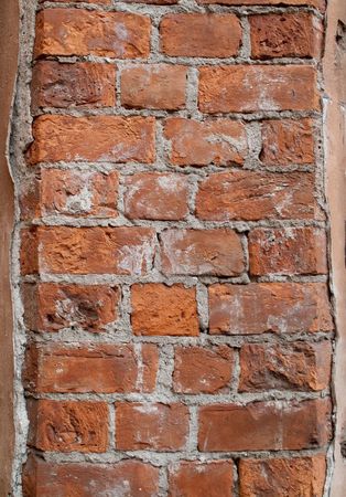 Rough and weathered old dirty brick wallの写真素材