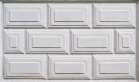 Gray concrete textured tiled wallの写真素材