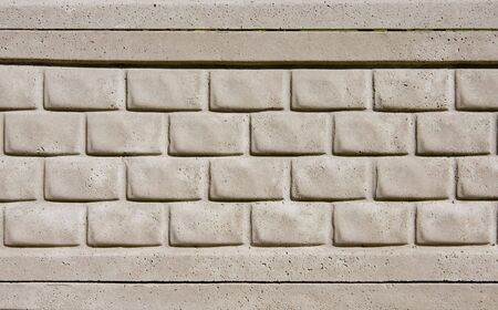 Gray concrete textured tiled brick wallの写真素材