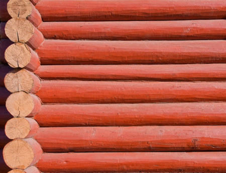 Background of old red  wooden boards (beams)の写真素材