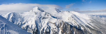 Panorama of winter mountains. Alpine ski resort Bansko, Bulgaria