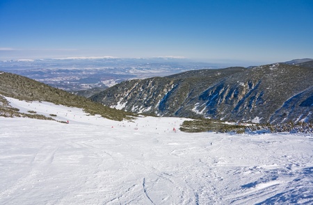 Alpine ski slope at winter resort Bansko, Bulgariaの写真素材