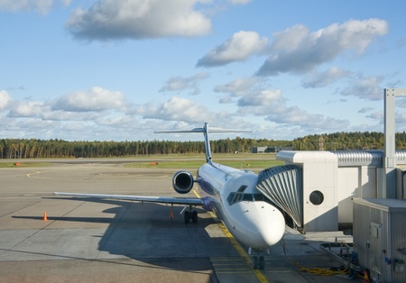 Airplane prepare to boarding at the gate in airport terminal of Helsinki, Finlandのeditorial素材