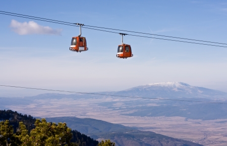Cable car ski lift over mountain landscape. Rila mountains, ski resort Borovets, Bulgariaの写真素材