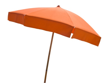 Orange beach umbrella isolated on white with clipping pathの写真素材