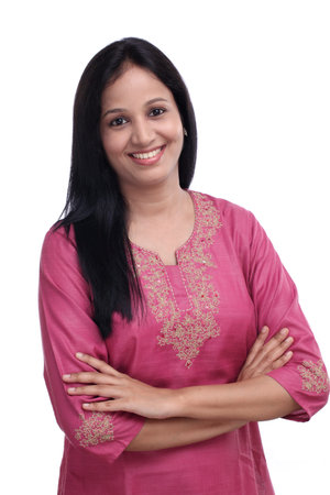 Portrait of young Indian woman against white background