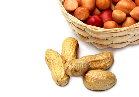 Fresh peanuts over white background