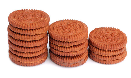 Chocolate cookies over a white background