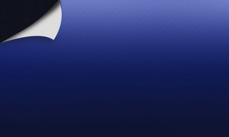 Abstract gradient background in blue with noise grain texture. The top corner of the picture has a folded paper shape, giving the picture a 3D look.の写真素材