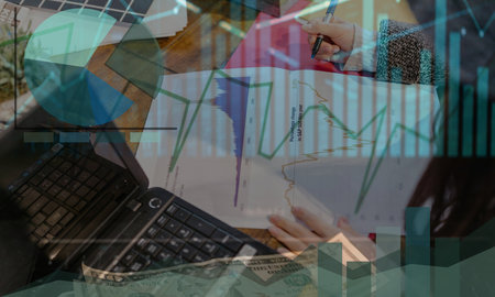 Businessman image analyzing graphs and data, business reportの写真素材