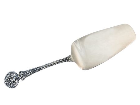 Isolated silver cake spatula against the white backgroundの写真素材