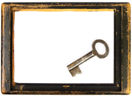 vintage wooden frame with old small keyの写真素材