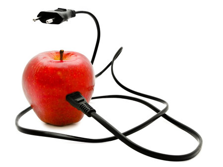 red electrical apple whith electrical cord over white backgroundの写真素材