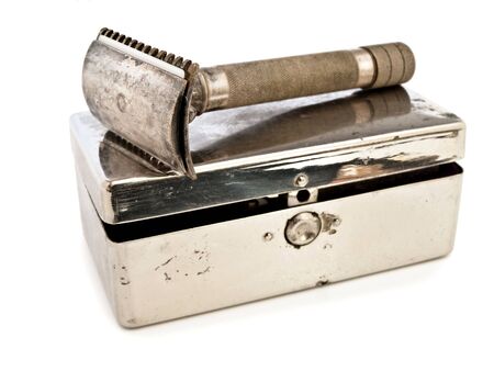 shaving set over the blades case against the white backgroundの写真素材