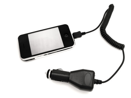 mobile phone with car adapter against the white background