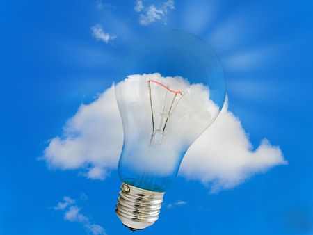 bulb against single cloud in the blue clear sky の写真素材