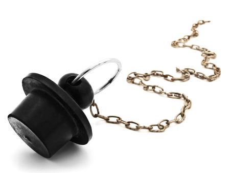 black bath plug against the white backgroundの写真素材