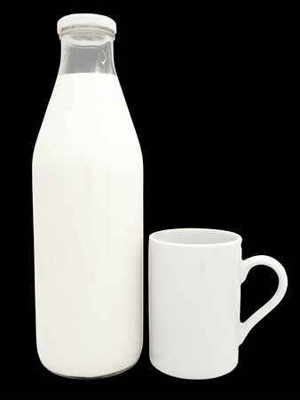 bottle of milk with mug near it against the black backgroundの写真素材