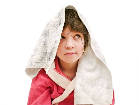 young girl portrait with towel after bath against the white backgrounの写真素材