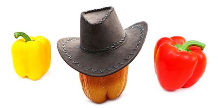 cool pepper in cowboy hat surrounded by vegetablesの写真素材
