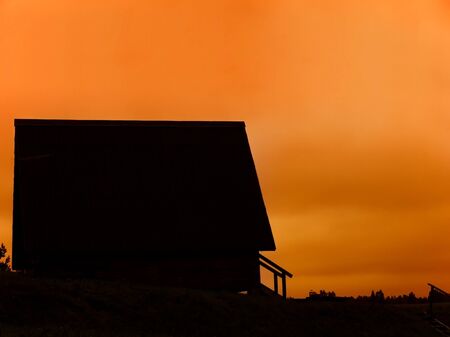 countryside house silhouette in the nightの写真素材