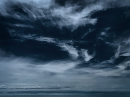 overcast stormy sky over the sea in winterの写真素材