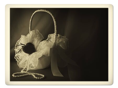 Old photo of bridal flower basket with pearl neklaceの写真素材
