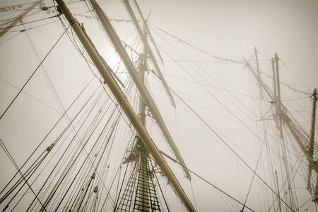 Masts Of Sailboats In The Fogの写真素材