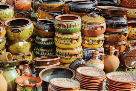 A Lot of Old Earthenware Crockery on the Pottery Marketの写真素材