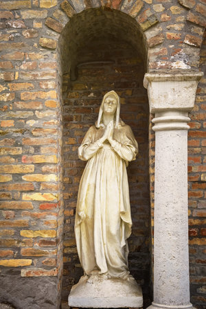 Statue of Virgin Mary in a Niche of the Wallの写真素材