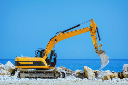 The Yellow Excavator on the Seaside