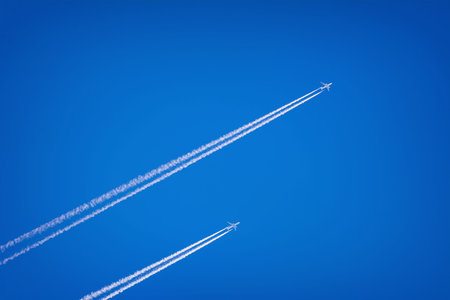 Two Jet Airplanes in the Blue Skyの写真素材