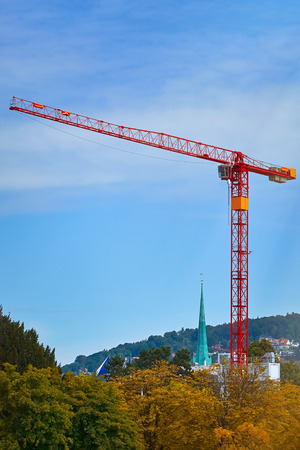 Tower Crane in Zurich against Blue Skyの写真素材
