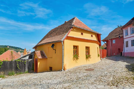 Street in Old Town of Sighisoara, Romaniaの写真素材