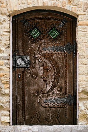 An old wooden door with the fretworkの写真素材