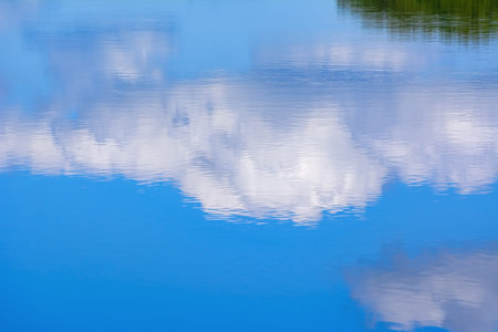 Reflection of the cloud in the lakeの写真素材