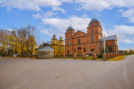 Old and new buildings of Malnava Holy Mary Mother of Rosary Churchの写真素材